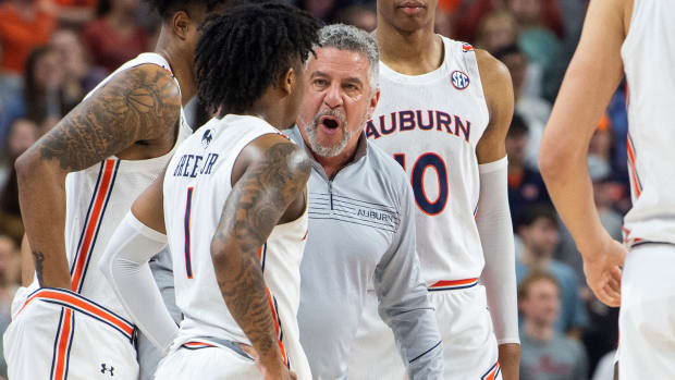 Auburn Tigers head coach Bruce Pearl talks with his team during a break in the action at Auburn Arena in Auburn, Ala., on Wednesday, Feb. 16, 2022. Auburn Tigers lead Vanderbilt Commodores 42-38 at halftime.